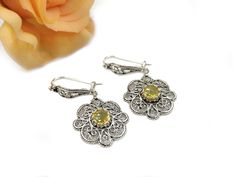 "Citrine 925 Sterling Silver Flower Women Dangle Earrings, Handcrafted Filigree Art Boho Dangle Drop Earrings The length is 1.60\" and width is 0.80\". The weight is 5.00 gr. Citrine gemstone is 6 mm faceted rose-cut, round-shaped. Comes with a free velvet pouch, silver polish cloth and a luxurious gift box. Filigree is made of delicate metal strands that have been skillfully fashioned to create an outstanding combination of old and modern art. Originating in Mesopotamia, Anatolia. It is made of Yellow Earrings With Intricate Design For Gift, Flower Women, Filigree Jewelry, Silver Polish, Citrine Gemstone, Velvet Pouch, Sterling Silver Flowers, Etsy Earrings Dangle, Silver Flowers