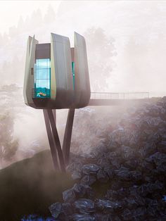 a futuristic looking building on top of a hill