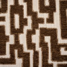 a brown and white pattern is shown on the fabric, which has been made from wool