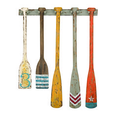 It's fascinating how lifestyle vignettes end up captivating our memories. Featuring brightly colored, hand painted designs with an uncanny used-for-generations appearance, the Summer Oars Wall Display captures the sun, sound and keen nostalgia of water-side living. Perfect for today's thematic mud and media rooms. | Elk Home Summer Oars Wall Art in Multicolor | Mathis Home Painted Oars, Madeira Beach Florida, Oar Decor, Wooden Oars, Boat Oars, Dimensional Wall Art, Dimensional Wall, Style Cottage, Beach Cottage Style