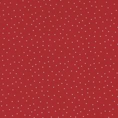 a red background with white dots on it