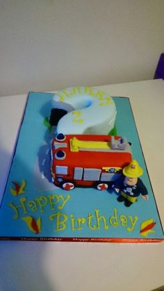 the birthday cake is shaped like a firetruck