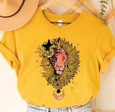 Floral Lion Shirt, Cute Shirts for Women, Lion Shirt, Lion Flower Shirt, Leo Shirt, Gift for Her, Animal Lover, Graphic Tees, Animal Shirts 📢Please Check All Photos For Details.   📢Choose Your T-Shirt Size From The Drop-Down Lists Next To The item Picture   📢Choose Of Your T-Shirt Color From The 2nd Picture 🧨Please contact the store for long-sleeved shirt and sweatshirt color options. 🧨Please check which product you are paying for in the size options section, because there are different options such as short-sleeved shirts, V-Neck, sweatshirts and long-sleeved shirts. 📢Use "Add message to Seller" link On The Checkout Page To Send me the Following important Details For Your Order's Customization.   📢Shipping Time Varies by location (we are located in Sugar Land, Texas) please conside Cute Shirts For Women, Lion Flower, Lion Shirt, Sugar Land, Flower Shirt, Animal Shirts, Shirts For Women, Cute Shirts, Shirt Color