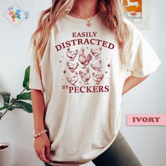 Funny Chickens Shirt For Womens Animal Lover Homestead Tshirt Easily Distracted By Peckers Shirt The Models in the pictures are wearing 1 or 2 sizes up, Please order 1 or 2 sizes up for an oversized look. ❤ Welcome to my store ❤ I care about your happiness and try to produce original designs for you. If you are wondering how this design looks on other products please click the following links;  Please contact me if you have a request to customize designs. PRODUCT FEATURES ♥ DTF Print, Comfort Co Homestead Shirt Ideas, Dtf Print Designs Tshirt, Homestead Tshirt, Homestead Outfits Women, Funny Chicken Pictures, Funny Chickens, Dog Mom Life, Funny Animal Shirts, Funny Adult Shirts