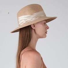 Sand toyo packable UPF 25+ protection fedora with cream shiny satin ruched band. UPF 25+ protection. Measurements: 6" X 3.75" X 3" SKU: 21005-250CS Elegant Beige Fedora Panama Hat, Elegant Beige Fedora Straw Hat, Elegant Beige Straw Hat For Travel, Elegant Cream Travel Hat, Cream Fedora Sun Hat For Kentucky Derby, Cream Fedora Panama Hat For Kentucky Derby, Beige Short Brim Fedora For Kentucky Derby, Elegant Panama Hat With Upf 50+ For Travel, Kentucky Derby Cream Fedora Sun Hat