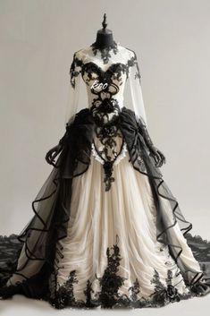 Gothic Ball Gown For Wedding, Elegant Black Ball Gown For Costume Party, Fitted Black Ball Gown For Costume Party, Gothic Wedding Dress With Fitted Bodice, Black Gown With Fitted Bodice For Costume Party, White Ball Gown Dress With Detachable Train, Gothic White Party Dress, Elegant Black Halloween Gown, White Gothic Party Dress