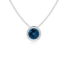 The round London blue topaz appears to be floating on the chain. It is secured in a platinum bezel setting and exudes a pleasing hue. This stunning London blue topaz solitaire pendant is designed to make an elegant statement. December Birthstone Jewelry, Solitaire Pendant Necklace, Elegant Pendant, Solitaire Pendant, London Blue Topaz, London Blue, Fine Jewellery Necklace, Gold Platinum, Bezel Setting