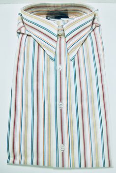 Vintage Polo by Ralph Lauren striped shirt, 100% cotton, cream color with yellow, blue, green, red stripes, no pockets, never worn. Size: collar 15.5, sleeves 32. Cotton Tops With Vertical Stripes And Spread Collar, White Collared Tops With Vertical Stripes, White Top With Striped Spread Collar, Cotton Collared Polo Shirt With Three Stripes Branding, Cotton Polo Shirt With Three Stripes Branding, White Button-up Top With Vertical Stripes, Retro Polo Collar Top With Striped Detail, Vintage Striped Collared Polo Shirt, White Vertical Stripe Button-up Top