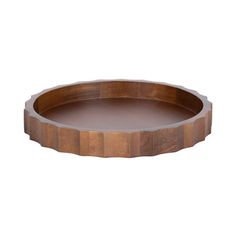 a round wooden tray on a white background