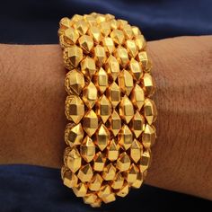 Discover the allure of Handmade Gold Jewelry at https://morvijewels.etsy.com/   Get a dazzling 25% off on all our 22k and 18k gold pieces. Don't miss out on this limited-time offer. Shop now and embrace the radiance of gold!22 karat wedding traditional vintage antique ethnic yellow gold bujuband bracelet or armband for women Gold Purity- 22k yellow Gold Weight - 50 grams approx for one pair width- 4 cm Size - adjustable fit on any wrist and arm  Please contact for any changes as per your require Traditional Jubilee Bracelet For Festive Occasions, 22k Gold Beaded Bracelet Gift, Traditional Gold Jubilee Bracelet Bangle, Gold Beaded Bangle Bracelets For Wedding, 22k Gold Tilla Bangle Bracelet, 22k Gold Bangle Bracelet With Tilla, Gold Cuff Bracelet For Festive Occasions, Bangle Bracelets For Puja Festivals, 22k Gold Temple Jewelry Bracelets For Festivals