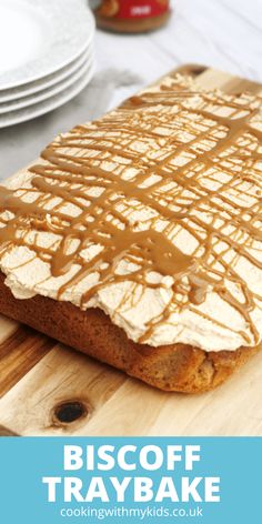 a loaf of biscoff tray bake on a cutting board with the title above it