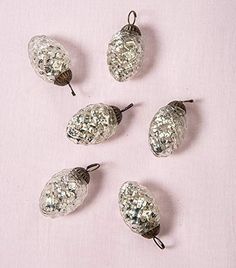 PRICES MAY VARY. Set of 6. Luna Bazaar's vintage Christmas ornament set has an antique looking Silver metallic finish. These mini mercury glass pine cone ornaments are the perfect holiday ornaments to use as mini Christmas tree decorations, holiday home decor or for wedding gifts and favors. We have a wide variety of holiday ornaments in different sizes, colors and styles. Product SpecificationsDimensions: Approximately 1 - 1.5 inchesColor: Silver Mercury GlassMaterial: GlassWhat's Included: 1 p Pine Cone Ornaments Christmas, Pine Cone Ornaments, Cone Ornaments, Mini Christmas Tree Decorations, Mercury Glass Christmas Ornaments, Mercury Glass Christmas, Ornaments Christmas Tree, Large Christmas Tree, Pinecone Ornaments