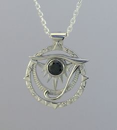 "This egyptian pendant is made with sterling silver ; this represent a unique motif of eye of horus, a well-know egyptian symbol. It is very original, drawn and made by the artist. A perfect blend of past and present,  it is a one-of-a-kind jewel which will pass the test of time. A ideal present  for birthday(anniversary), Mother's Days, wedding, Christmas or to offer itself to oneself! dimensions : 1\" x 7/8\" Because the environment means a lot to me just like you, all my jewelry is sent with the recyclable material, such as paper bags and boxes of jewels made with 100% recycled cardboxes made with 77% post-consumer fiber and 23% pre-consumer fiber. Also I use small biodegradable plastic bags. I print your invoices on ecological certified paper, earth choice" Egyptian Silver Jewelry, Egyptian Pendant Jewelry, Egyptian Pendant, Egyptian Collar, Ancient Egypt Necklace, Egyptian Scarab Necklace, Egyptian Necklace, Large Pendant Necklace, Egyptian Symbols