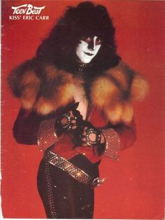 an advertisement for kiss's eric - carr album, with a woman in costume