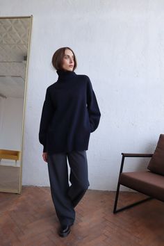 Oversized Knitted Sweater For Work, Oversized High Neck Sweater For Work, Navy Cashmere Sweater For Work, Blue Cashmere Turtleneck Sweater, High Neck Wool Sweater For Work, Soft Knit Funnel Neck Sweater For Work, Funnel Neck Soft Knit Sweater For Work, Blue Merino Wool Polo Sweater For Workwear, Oversized Polo Sweater For Work