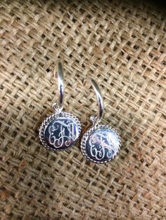 Beautiful Monogrammed Pure Sterling Silver (not plated) Hoop Earrings with 16 mm engravable round drop with rope accents. 🔴IMPORTANT INSTRUCTIONS🔴 Initials should be given in order as they will be monogrammed in the order given: FIRST NAME LAST NAME MIDDLE OR MAIDEN NAME 🚩Please type them in the notes to seller area or message me if ordering from smithwrightco sterling.com. Sterling Silver Monogrammed Hoop Earrings- A great gift that will last a lifetime- These classic, pure sterling silver e Personalized Silver Dangle Hoop Earrings, Personalized Round Silver Earrings, Personalized Small Hoop Silver Jewelry, Silver Hoop Earrings For Personalized Gift, Personalized Sterling Silver Hoop Earrings, Silver Hoop Jewelry For Personalized Gift, Personalized Silver Hoop Jewelry, Silver Monogram, First Name