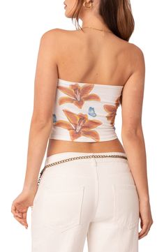 Tiger lilies and butterflies bring a sense of joy to this smooth and stretchy cotton tube top. Strapless 95% cotton, 5% spandex Machine wash, dry flat Imported Fitted Seamless Tube Top For Spring, White Strapless Tank Top For Spring, White Fitted Floral Print Tube Top, Fitted White Floral Print Tube Top, Fitted Floral Print Bandeau Top, Fitted Bandeau Top With Floral Print, Strapless Seamless Top For Spring, White Floral Print Tube Top For Summer, Stretch Cotton Summer Tube Top