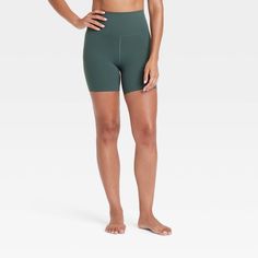 Why we're ALL IN: Soft bike shorts in a solid color designed in an ultra-high-rise cut with flat seams. Made of a soft, stretchy fabric with moisture-wicking and quick-drying properties to help keep you nice and cool. Boast a UPF 50+ rating for sun protection. Pull-on waistband completes the design with easy on and off. All in Motion™: Made for every move, priced for every day.