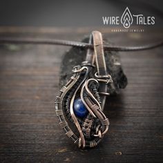 Wire wrapped bohemian copper necklace pendant with natural Lapis Lazuli gemstone. Copper was oxidized to create antique look and to highlight the details of the wire work. It is a unisex necklace so it fits both men and women. This copper necklace comes with brown waxed cotton cord which has adjustable sliding knot and it can easily be adjusted to your preferred length. This necklace was made out of natural copper wire, so it is going to get darker over the time, but no worries, it is easy to ma Bohemian Crystal Necklace With Copper Wire For Gifts, Bohemian Copper Wire Crystal Necklace As Gift, Blue Copper Necklace As Gift, Adjustable Hand Wrapped Copper Crystal Necklaces, Adjustable Hand Wrapped Copper Crystal Necklace, Adjustable Copper Amulet Jewelry, Bohemian Copper Wire Pendant Jewelry, Handmade Artisan Crystal Necklaces With Copper, Bohemian Copper Wire Wrapped Crystal Necklaces