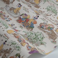 the wallpaper has many cartoon characters on it