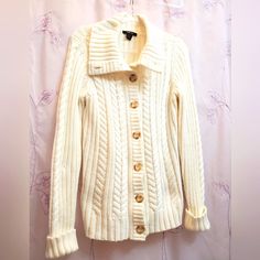 Very Cosy Style And Company Cardigan, Cuff Sleeve, High Buttom Up Collar .So Many Ways To Wear This Treasure. Great With Bulky Or Regular Scarf .Wear Layered. Or Just Over Light Top. Excellent Pre-Owned Condition. White/Cream Perfert Addition To Wardrobe. White Cable Knit Button-up Outerwear, White Cotton Cardigan With Button Closure, White Trendy Cardigan With Ribbed Cuffs, Trendy White Cardigan With Ribbed Cuffs, White Sweater Coat With Button Closure, White Knit Cardigan With Ribbed Cuffs, White Casual Cardigan With Ribbed Cuffs, White Button-up Sweater For Fall, Casual White Cable Knit Sweater Coat