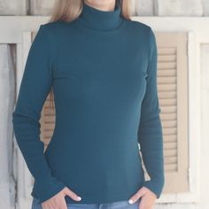 Do you like feeling stylish and warm? Try our 100% Merino wool high-neck jumpers for women. Start the cold season of the year with our exceptional 100% merino wool turtleneck jumper. This elegant high-neck sweater not only looks great but also keeps you pleasantly warm and cosy.  Some features of this merino wool sweater: ✔ Green Rose turtleneck jumper is made from luxurious merino wool, which ensures warmth in the cold season. In addition to that, it is also exceptionally soft and feels pleasant next to the skin. ✔ The high collar of the sweater not only looks stylish but also protects your neck from the cold. ✔ This knitted jumper is just as warm as a regular thick woollen jumper; however, it is much thinner. The fabric is knitted in rib stitch which adapts to the body contours and gives Merino Wool Turtleneck Top, Merino Wool Turtleneck With Funnel Neck For Winter, Winter Merino Wool Ribbed Turtleneck, Ribbed Merino Wool Turtleneck For Winter, Ribbed Merino Wool High Neck Turtleneck, Winter Merino Wool Funnel Neck Top, Winter Ribbed Turtleneck, Winter Ribbed High Neck Turtleneck, High Neck Merino Wool Tops For Fall