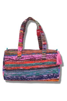 The Santa Barbara Handbag in Berry is a colorful accessory for any day of the week. This large handbag has a fun turquoise liner with a zipper pouch and 2 convenient quick-access pockets perfectly sized for your phone and sunglasses. What makes the Santa Barbara collection so special? Our Santa Barbara Collection is designed from Indian Chindi rugs. These rugs are composed of remnant fabrics making them eco-friendly and unique with each piece. That means no two are exactly the same, just like yo Everyday Upcycled Rectangular Shoulder Bag, Upcycled Everyday Rectangular Shoulder Bag, Everyday Use Upcycled Rectangular Shoulder Bag, Upcycled Satchel Bag For Everyday Use, Everyday Upcycled Satchel Bag, Everyday Use Upcycled Satchel Bag, Eco-friendly Upcycled Bags For Daily Use, Multicolor Duffle Bag With Removable Pouch For Daily Use, Upcycled Shoulder Bag For Daily Use