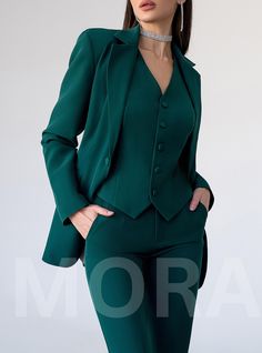 Three-piece pantsuit for women: straight leg pants with high rise, buttoned vest and lined blazer Please note suit measurements  Pants length inseam is 36 inches or 91 cm Sleeve length 24 inches or 61 cm Our Women's Blazer Trouser Suit for office, business meetings, formal events and special occasions. Always trendy, classic and o good looking DETAILS -  straight leg pants -  high rise -  blazer is buttoned -  lined -  side pockets -  relaxed fit -  single breasted -  buttoned vest MATERIAL Prem Luxury Green Blazer For Workwear, Luxury Green Blazer For Fall, Luxury Green Blazer For Work, Luxury Green Blazer For Business, Kelly Green Pant Suit Christmas, Luxury Green Slim Fit Blazer, Luxury Green Suits For Semi-formal Occasions, Luxury Green Office Wear Blazer, Luxury Green Fall Blazer