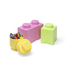 lego blocks and containers with candy in them