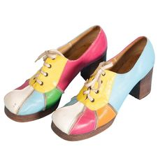 1970s platform heels ! ADORABLE multicolored oxford style heels! Comes with white(ish) laces and color-block  pattern. Made by Battani Imports from Brazil. Labelled a size 8/8.5, however after measuring it seems to more accurately equate to a US standard Women's size 7.5. Shoes are also pretty narrow. See measurements below. Measurements Length: 9.5" Width: 3.5"  Size: 7.5A (Narrow) Women's Height of Heel: 3" Heel Width (at bottom): 1.75" Condition: Good; some scuffing and overall wear (See imag Groovy Shoes, 70s Platform Shoes, 1960 Shoes, 60s Shoes, 1970s Shoes, 1960s Shoes, Nyc Fits, Vintage Shoe, Seventies Fashion