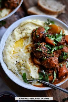 a bowl filled with mashed potatoes and meat