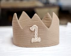 Personalized Crown *100% soft cotton Gauze Fabric Crown *Available as a tieback for size adjustment *These crowns will fit starting from 6 Months to 6 year old Matching OUTFIT Suspender Bloomer shorts https://beeteeboutique.etsy.com/listing/1477304672/ Bloomer (diaper cover) https://beeteeboutique.etsy.com/listing/703231606 one-piece ROMPER https://beeteeboutique.etsy.com/listing/713372987 Crown For Birthday, Boy Crown, Hat Photography, Bloomer Shorts, Fabric Crown, 1st Birthday Pictures, First Birthday Boy, Colorful Birthday Party, First Birthday Pictures