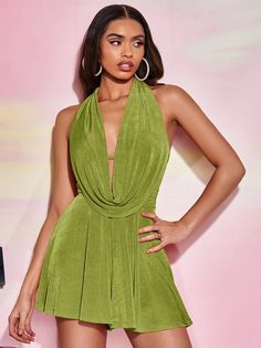 Look sophisticated in this Draped Front Backless Halter Neck Romper. Styled with a spaghetti strap neckline, plain pattern type, and sleeves, this romper is crafted of 91% polyester and 9% elastane with a slight stretch for a comfortable fit. Featuring crisscross, lace-up, and grommet eyelet details, this romper is perfect for your warmer-weather wardrobe. Enjoy a stylish, casual look with this short, unlined, and non-sheer romper. Specifications: Neckline: Spaghetti Strap Pattern Type: Plain Sleeve Length: Sleeveless Details: Criss Cross, Lace Up, Grommet Eyelet Length: Short Belt: No Fabric: Slight Stretch Composition: 91% Polyester, 9% Elastane Care Instructions: Machine wash or professional dry clean Body: Unlined Sheer: No Size Chart(cm): Size Bust Hip Size Length Shoulder Thigh Waist Summer V-neck Tie-back Jumpsuits And Rompers, V-neck Tie Back Jumpsuit For Vacation, Spring Beachwear Halter Dress, Backless, Flirty Backless Summer Jumpsuit/romper, Summer V-neck Tie-back Jumpsuit, Comfy Jumpsuits, Clean Body, Fabric Suppliers, Halter Neck