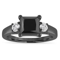 a black diamond ring with three diamonds on it