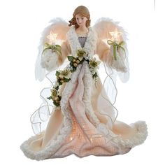 an angel figurine with flowers and lights