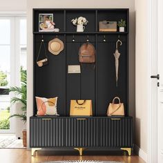 a black coat rack with purses, hats and other items hanging on the wall