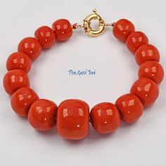 DESCRIPTION: Thank you for coming in! Beautiful rare Mediterranean Sardinia Coral with stunning tomato red color and lovely barrel shape! The color is directly from the ocean, not dyed! 100% natural beauty! 7.8 inch bracelet with 15 huge coral barrels and 18k solid gold sailor clasp! Manufactured in Italy! Appr 48 Grams. You'll get the bracelet you see! SIZE of the coral : Appr.11mm-18.6mm Diameter COLOR: Red GRADE: AA Tomato Red Color, Coral Beads, Sardinia, Red Coral, The Ocean, Red Color, Solid Gold, Natural Beauty, Barrel