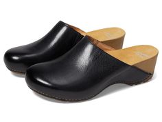 Dansko Talulah - Women's Shoes : Black Milled Burnished : The lightweight Dansko Talulah Clogs are ideal footwear that offers long-lasting durability. This shoe has received the American Podiatric Medical Association (APMA) Seal of Acceptance for promoting good foot health. Leather upper. Cow leather lining and insole. APMA certified. Slip-on style. Round toe design. PU midsole. Rubber outsole. Imported. Measurements: Heel Height: 2 1 5 in Weight: 1 lb 1.6 oz Platform Height: 9 10 in Product mea Black Clogs With Leather Sole For Formal Wear, Black Leather Sole Clogs For Formal Occasions, Black Leather Sole Clogs For Formal Wear, Black Formal Clogs With Leather Sole, Black Almond Toe Clogs With Leather Sole, Black Almond Toe Clogs With Rubber Sole, Formal Black Slip-on Clogs, Black Leather Clogs With Arch Support, Black Clogs With Flat Heel For Work