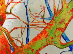 an abstract painting of trees with red, green and blue branches