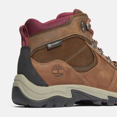 Conquer the mountains, the trails and everything in between with this women's mid-hiker boot. An anti-fatigue removable footbed provides comfort during extended hours of a rigorous stroll, while the TimberDry™ linings help keep your feet free from moisture and full of adventure. Timberland supports responsible manufacturing of leather through the Leather Working Group. Brown High-top Work Boots For Hiking, Winter Brown Mid-top Hiking Boots, Brown Waterproof Mid-top Hiking Boots, Timberland Low-top Hiking Boots For Outdoor, Brown High-top Hiking Boots With Reinforced Toe, Toddler Timberlands, Western Dress With Boots, Tall Winter Boots, Timberland Women