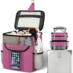 two pieces of luggage are shown with one open and the other closed, both in pink