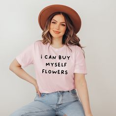 Express Yourself With Our Iconic "I Can Buy Myself Flowers" T-Shirt. A Statement Piece For The Fearless And Independent, This Tee Comes In Multiple Bold Hues. Embrace Your Individuality And Make A Fashion Statement With This Comfortable And Stylish Shirt. Don't Wait, Be The Queen Of Self-Love And Add This Must-Have Item To Your Wardrobe Today! For Additional Sizes And Colors Please See Pics For More Info! Thank You For Considering To Purchase From A Female Small Business Owner! Pink Tops With Funny Text For Spring, Trendy Pink Tops With Funny Text, Trendy Pink Top With Funny Text, Cute Pink Tops With Funny Text, Trendy Pink T-shirt With Funny Text, Pink Relaxed Fit Slogan Tops, Pink Relaxed Fit Tops With Slogan, Pink Summer T-shirt With Funny Text, Summer Pink T-shirt With Funny Text