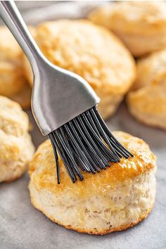 a close up of a piece of bread with a brush in it