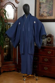 HAORI SIZE: Vertical Length: 93 cm (Collar Seam to Hem) Horizontal Length: 73 cm (Sleeve to Center Back Seam) Sleeve Depth: 53 cm (Sleeve Top to Bottom) Torso Width: 65 cm (Armpit to Armpit) KIMONO SIZE: Vertical Length: 142 cm (Collar Seam to Hem) Horizontal Length: 72 cm (Sleeve to Center Back Seam) Sleeve Depth: 52 cm (Sleeve Top to Bottom) Torso Width: 66 cm (Armpit to Armpit) FABRIC: Synthetic Fiber GAUGE: Medium TEXTURE: Soft CONDITION: Excellent NOTE: Haori has 5 family crests and Kimono also comes with 5 family crests. BLEMISHES: Haori's sleeve and chest area exhibits light stains. Please see gallery images for details. Please note white Hanjuban undergown shown in gallery images is not included. Kimono Ensemble is a combo set with Kimono gown and Haori jacket. Due to the nature of Traditional Fitted Kimono With Kimono Sleeves, Traditional Sets With Kimono Sleeves For Wedding, Traditional Wedding Sets With Kimono Sleeves, Traditional Long Kimono For Ceremonies, Traditional Long Fitted Kimono, Traditional Fitted Long Kimono, Traditional Long Wedding Robe, Traditional Long Sleeve Kimono For Ceremonies, Samurai Style Kimono For Tea Ceremony