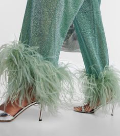 Find OSEREE Oséree Lumière Plumage Feather-trimmed Lamé Pants on Editorialist. Material: 64% polyamide, 36% metallic fibres. Care instructions: hand wash. Made in Italy. Trim: 100% ostrich feathers. Elasticated drawstring waist. Chic Winter Coat, Color Name, Ostrich Feathers, Made In, Winter Coat, Drawstring Waist, Feathers, Care Instructions, In Italy