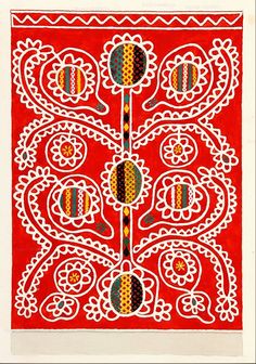 an intricately designed red and white painting