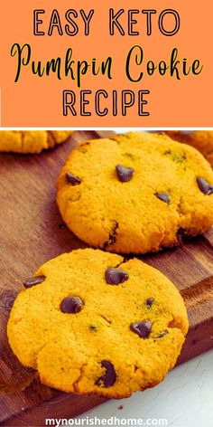 two pumpkin cookies on a cutting board with the words easy keto pumpkin cookie recipe