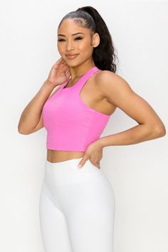 Featuring a high neckline and a strappy open back, this longline sports bra is perfect for any type of workout and you'll be fully supported with style. Best part, the inner lining is all mesh with two removable pads for your comfort. Strappy X back detail High neckline Matte fabric detail Two removable cups with mesh lining Longline hem for comfort and tummy control during workouts Moisture wicking fabric 75% Nylon, 25% Spandex Lining: 80% Nylon, 20% Spandex Imported Model StatsHEIGHT: 5'9" BUS Sporty T-back Halter Top For Gym, Sporty T-back Halter Top For Sports, Pink Stretch Halter Top With Built-in Bra, Athleisure Crop Top With Built-in Bra For Light Sports, Pink Crop Top With Built-in Bra And High Stretch, Sports Activewear Crop Top With Built-in Bra, Activewear Crop Top With Built-in Bra For Sports, Pink High Stretch Crop Top With Built-in Bra, High Stretch Seamless Sports Halter Top