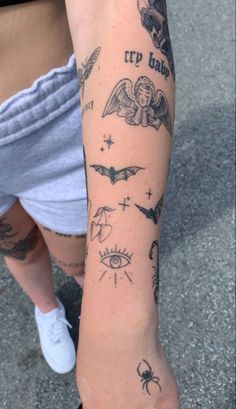 a person with tattoos on their arm and leg