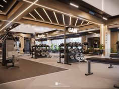 a large gym with rows of exercise equipment in it's center area and lights on the ceiling